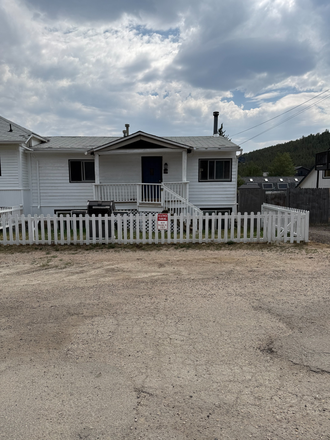 Entrance is on the right side and through the 6 foot fence. More photos coming - QUIET MOUNTAIN LIVING-23 MIN. TO CAMPUS-CHARMING TOWN OF NEDERLAND