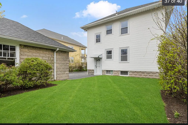 back yard - Bright first floor 2 BR 1BA apartment