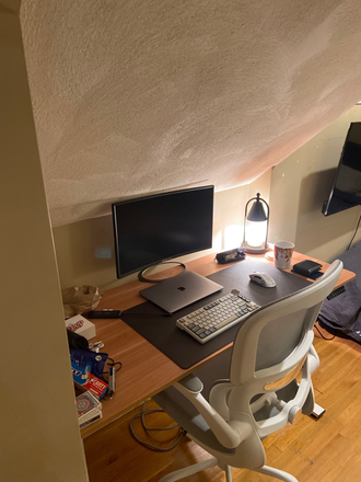 Desk and chair, with monitor - Sublease! In unit laundry! Less than 10 min. from BU campus, Spacious bedroom with connected bath Duplex