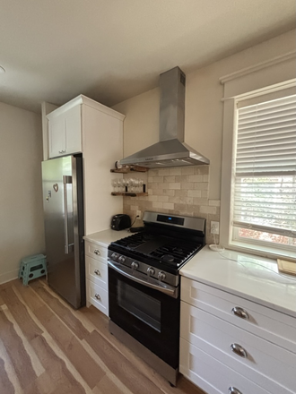 kitchen - Newly Renovated House on the hill with great backyard.