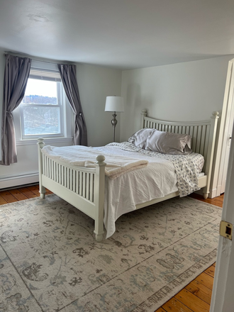 Bedroom - Furnished 1-Bedroom Unit (Utilities Included) Apartments