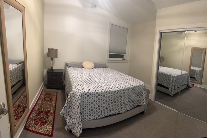 This bedroom has a large closet with mirror doors - Nice 3 bedroom house minutes to folly beach, 6.5 miles to MUSC