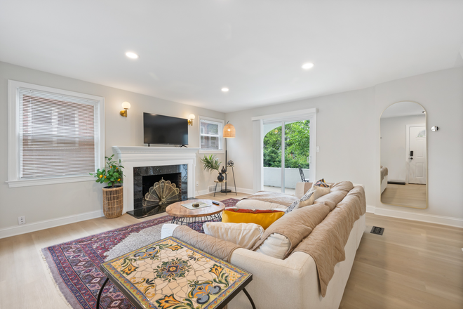 living room - 6BD/4BA Fully Furnished Home - 7-min walk to Bethesda Metro Red Line