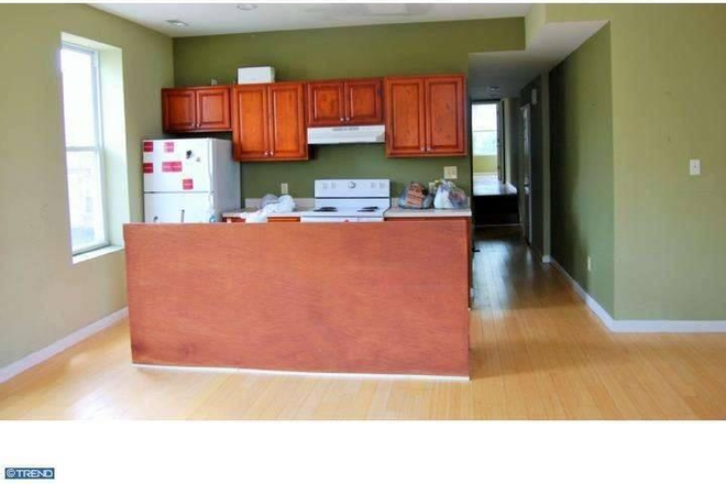 Kitchen - connected to living room - Corner Building with Large Renovated 3BR Apartment