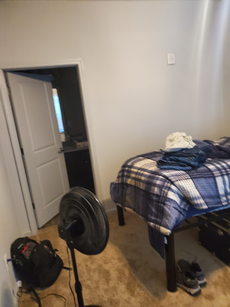 Bedroom Bed - Bellamy Apartment