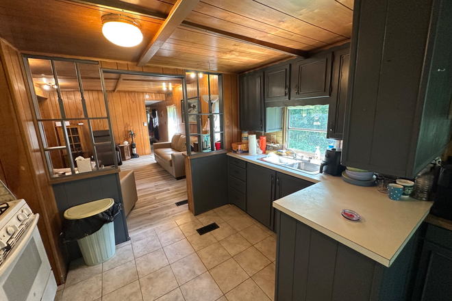 Kitchen - Home  with private lawn located less than 3 minutes from campus