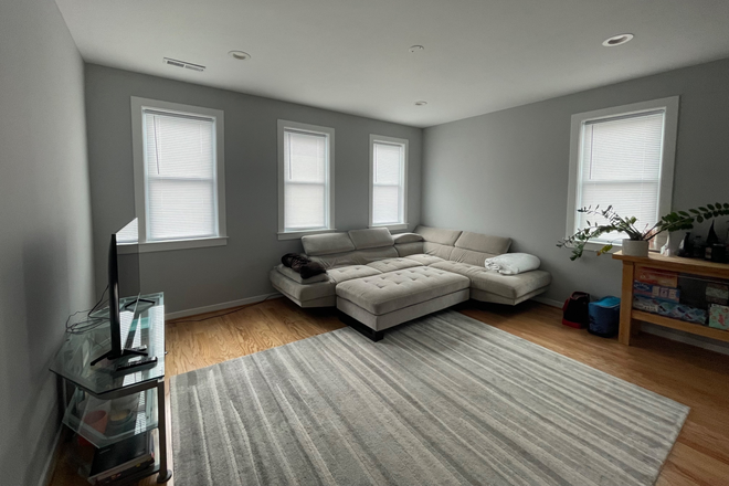 Living room - Private room/bath with parking space available House