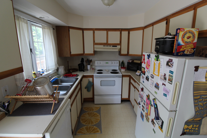 2 - Townhouse with equal sized bedrooms, 1.5 baths, parking.