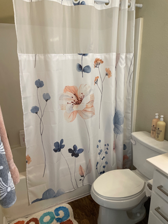 Shower, toilet, and hardwood floor - The Collective - close to campus