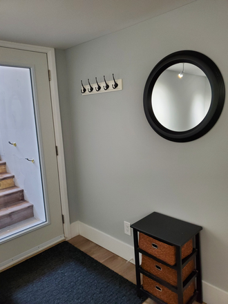 Private entrance, stairs and glass door to let in lots of light - Bathurst Manor Basement apartment