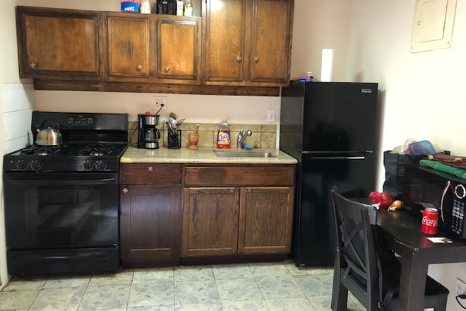 strip kitchen / dining area - Gorgeous Unit close to Transportation Apartments