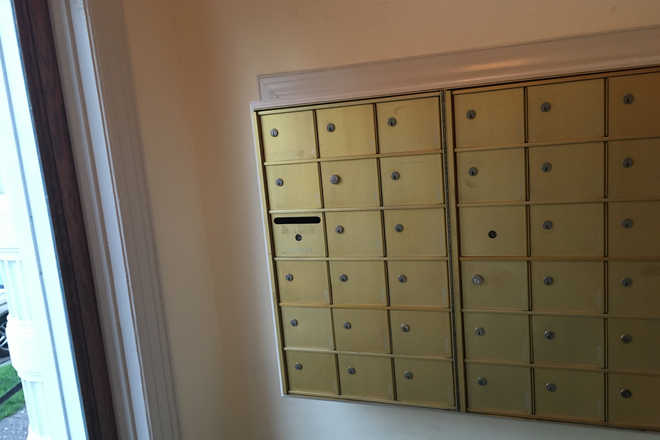 Building Mailbox area - $850.00 month furnished efficiency includes all utilities and WiFi Apartments