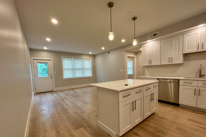 kitchen/living room - *NO BROKERS FEE!* NEW CONSTRUCTION! 2 Bed/2Bath LAUNDRY IN UNIT! Parking Inclu.! Avail. 8/1/26!! Apartments