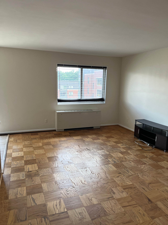 Living Room - College Park Tower, Large 2 bedroom/1bath unit available for 2025 - 2026 School Year