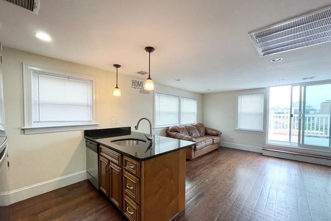 Living Room and Kitchen - Gorgeous top of the line 2 bed with private porch Apartments
