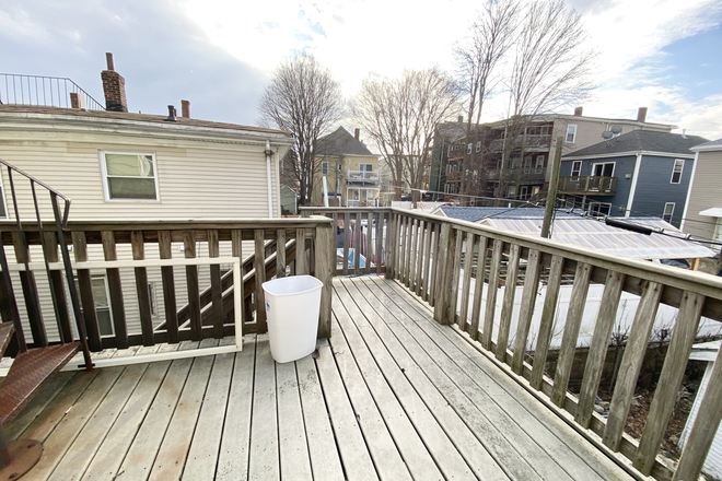 porch - 6-Bed, 2-Bath Duplex in Polish Triangle Open Layout & Deck Apartments
