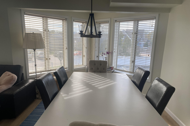 Kitchen Table - 22 Oceanside Place Apartments