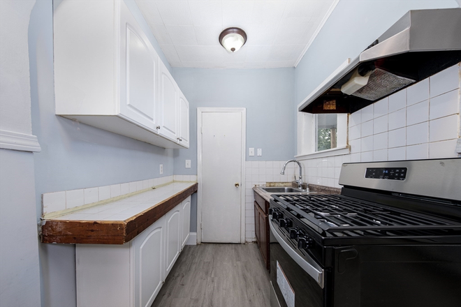 Kitchen - Updated 3 Bedroom with In Unit Laundry Apartments