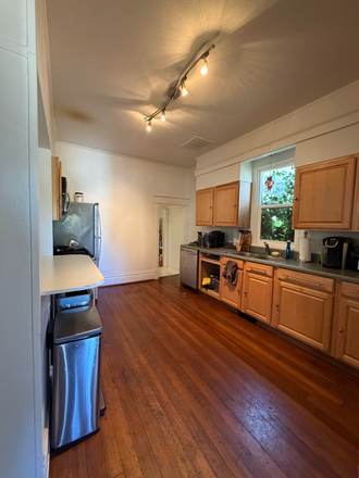 Kitchen, has a dishwasher, pantry, there is a mudroom behind that can serve as extra storage - Housing on the Hill Townhome
