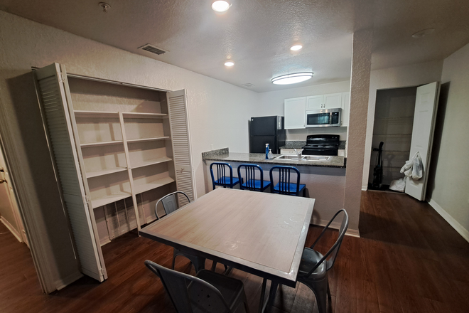 Kitchen area - Urgent - Bedroom in 4x2 Unit, Across the Street from Campus