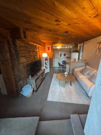 View of living room from entrance - Cozy one bedroom downstairs unit with bathroom and kitchen House