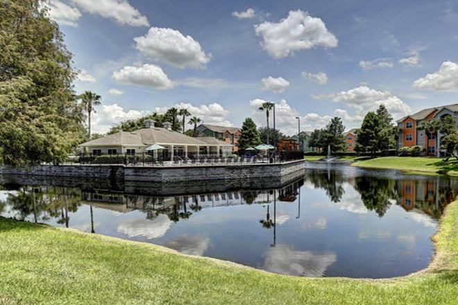 Lake by front office - The Village at Science Drive Apartments