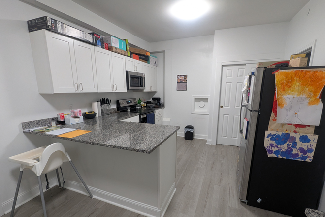 Kitchen viewed from dining area - Spacious 2 BR apartment. Utilities Included. Possibility to rent the entire unit or a single BR.