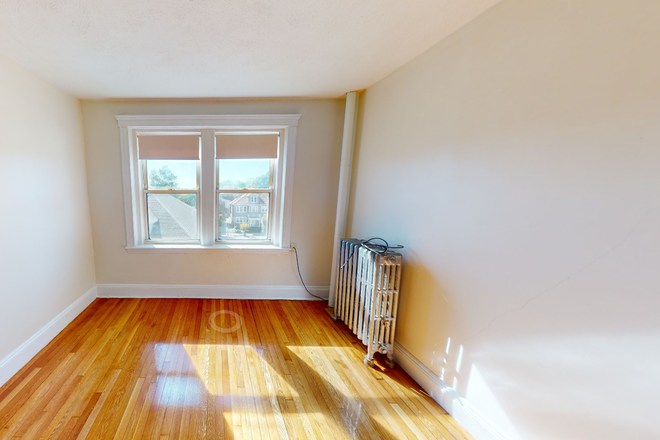 Visit hubrealtyproperties.com - Large studio with renovated kitchen and dishwasher, in Brighton Apartments