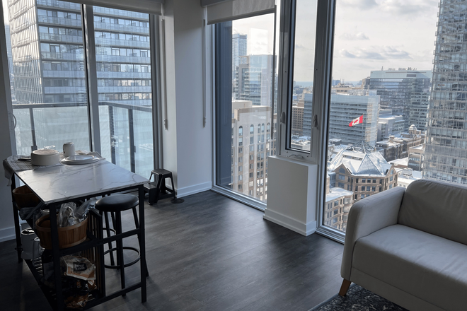 Living Room View - 2 Furnished Bedrooms in a 2 Bed 2 Bath Apartment at Yonge & Grosvenor