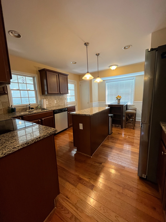 Kitchen with 4 seat bistro table and center island - 2891 Monticello Drive - walking distance to Reynolda village and campus House