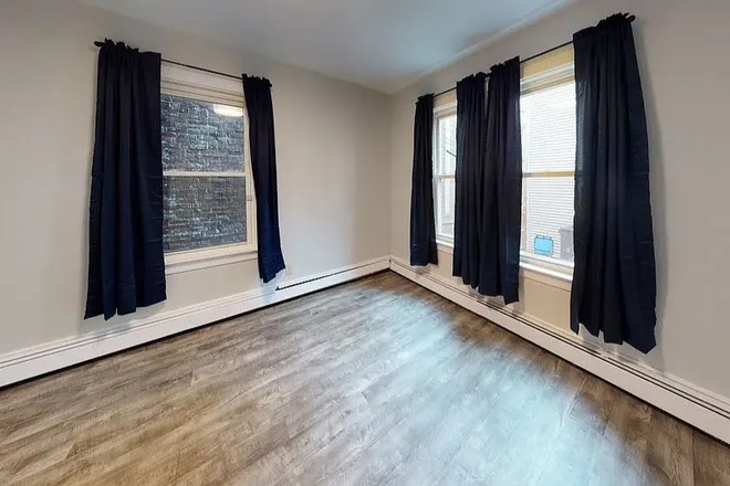 living - SPACIOUS 2 BED, UPDATED WITH WATER INCLUDED! NO BROKER FEE, 9/1/26! Apartments