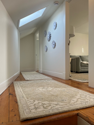 Hallway - Furnished 1-Bedroom Unit (Utilities Included) Apartments