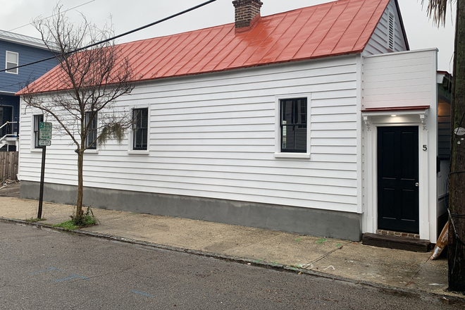 The house runs along Sheppard St. and shields its private backyard. - Award-winning, newly restored 2BR/2 bath house at 5 Sheppard St. (only whole house rental)