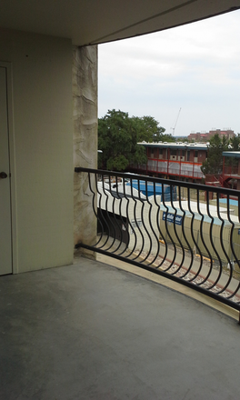 This photo shows the apt's patio. - Large 2-Bdrm 1-bath apt,DW, AC, patio,3rd flr, gym, pool,walk to CU-avail 8/16 (720-581-3491)