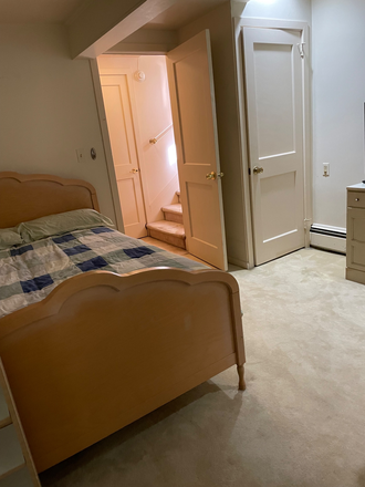 Full bed and carpet floor - Private furnished bedroom with a private cooking area House