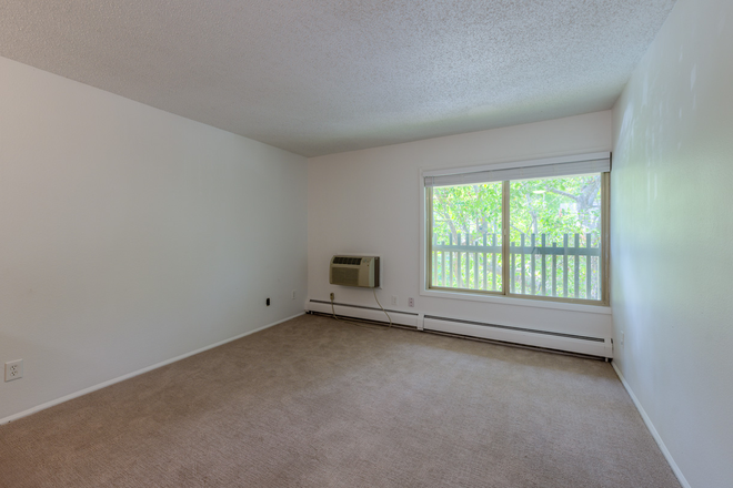 Living Room - 2BR Top-Floor Unit | Heat/Water/Trash Included | 2 Parking Spots | Near Bus & Shops | $925/person Apartments