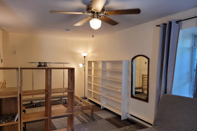 Bedroom area for bed, built-in cabinets - Adorable 1 bed Efficiency Apt