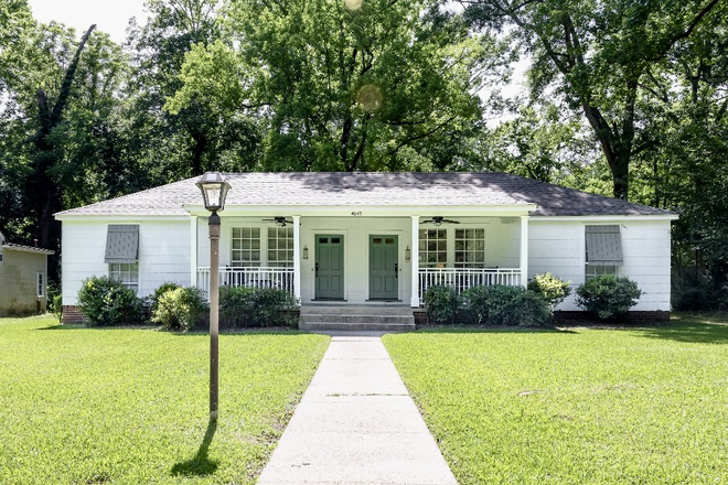 Street view - Furnished midcentury cottage in the heart of Fondren!