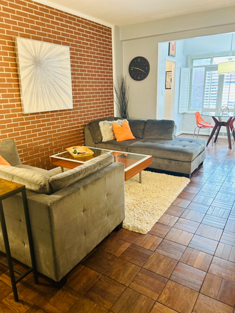 Living room with sofa, chaise & coffee table - DuPont Circle - Furnished Jr. 1- Bedroom. WIFI & utilities incl -1 block to Red Line Metro. Condo