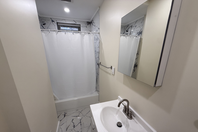 Bathroom - Beautiful New Studio located on Burbank St Available for Short or Long Term Lease!! Apartments