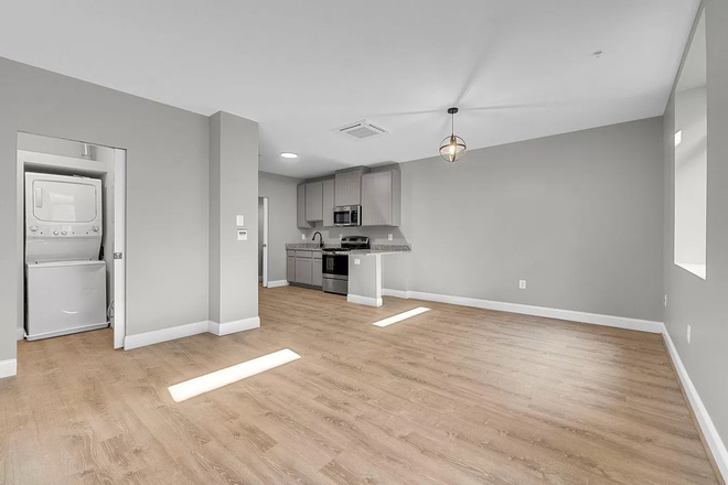 Bedroom /living area - 109 W Lexington Apartments, modern, downtown, great transportation options