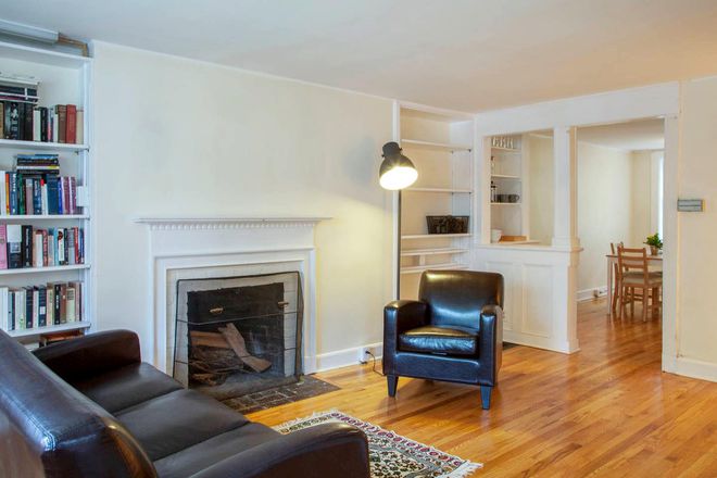 Living room, view of dining space - 2BR / 1 bath available April 2026 Apartments