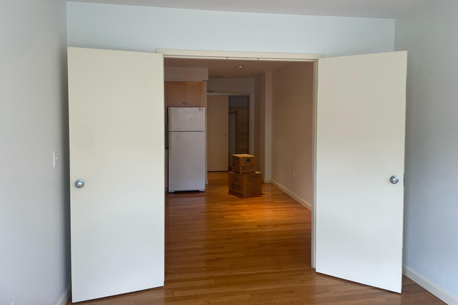 room 2 view to kitchen - Lovely 2 month sublet in the heart of Fenway Apartments