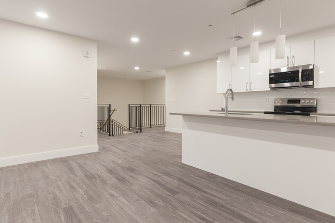 living - ONLY HALF BROKER FEE! 4 BED/3 BATH AVAIL. 9/1/26!