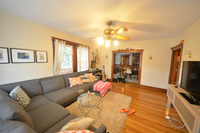 Living room - 3-Bedroom Apartment in Oak Square – Parking Included, Easy BC Commute