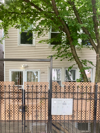 View from street, mailbox and locking gate - 1 Bed / 1 Bath / den apartment for rent