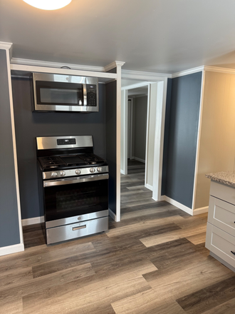 11 - Three bedroom one and a half bath House