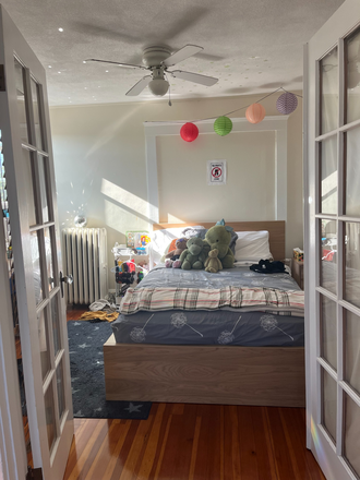 Bedroom with full size bed, french doors, huge closet - Room for Rent in Great House Near Davis Square and Tufts Campus!
