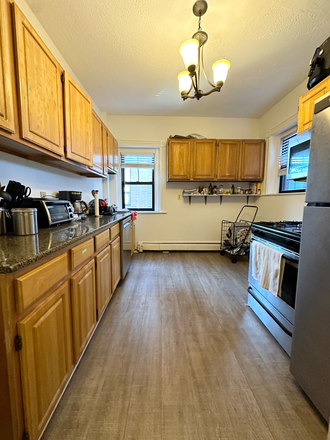 Kitchen - 4 bedroom on Tremont St. w/ tons of natural sunlight & laundry in unit