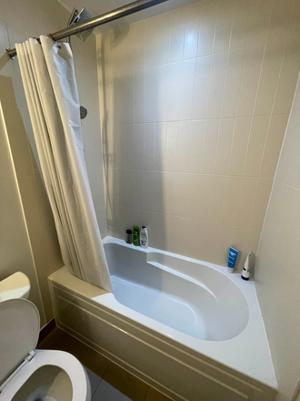 Bathroom shower - 1 Bedroom in 2-Bedroom Luxurious Apartment 'The Britt' at Bay Street next to Campus